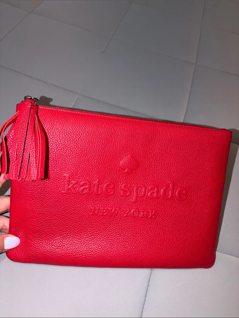kate spade Red Pebbled Leather Tassel Wristlet Clutch